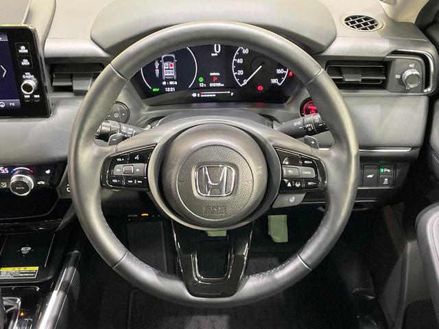 ヴェゼル e:HEV Z 純正9型ナビ 全周囲カメラ 衝突軽減 レーダークルーズ 禁煙車 電動リアゲート ハーフレザーシート ドラレコ コーナーセンサー スマートキー LEDヘッド 純正18インチアルミ オートハイビーム(11枚目)