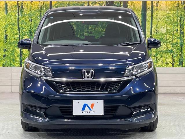 フリード+ G・ホンダセンシング SDナビ 後席モニター 衝突軽減 ETC バックカメラ 禁煙車 ハーフレザーシート スマートキー LEDヘッド フルセグ レーダークルーズ 純正15インチアルミ Bluetooth シートヒーター(14枚目)