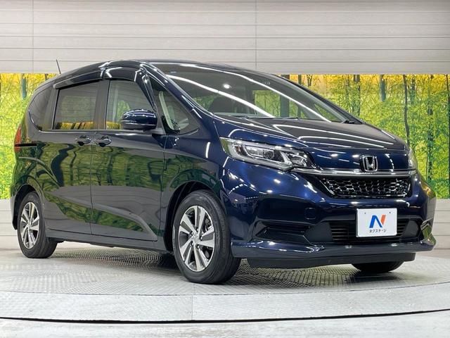 フリード+ G・ホンダセンシング SDナビ 後席モニター 衝突軽減 ETC バックカメラ 禁煙車 ハーフレザーシート スマートキー LEDヘッド フルセグ レーダークルーズ 純正15インチアルミ Bluetooth シートヒーター(16枚目)