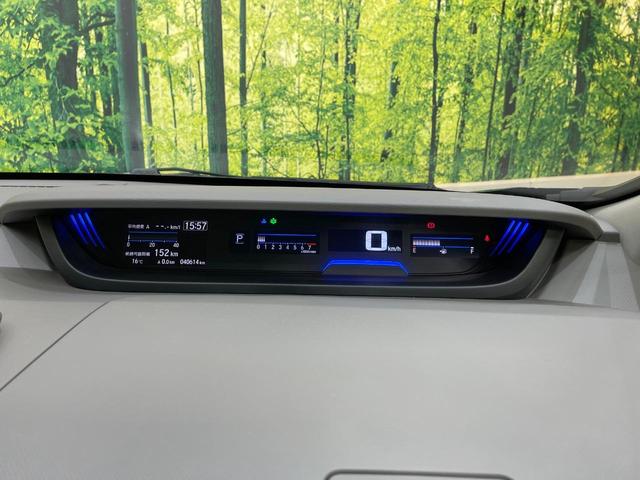 フリード+ G・ホンダセンシング SDナビ 後席モニター 衝突軽減 ETC バックカメラ 禁煙車 ハーフレザーシート スマートキー LEDヘッド フルセグ レーダークルーズ 純正15インチアルミ Bluetooth シートヒーター(25枚目)