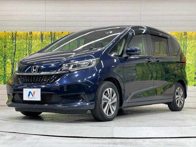 フリード+ G・ホンダセンシング SDナビ 後席モニター 衝突軽減 ETC バックカメラ 禁煙車 ハーフレザーシート スマートキー LEDヘッド フルセグ レーダークルーズ 純正15インチアルミ Bluetooth シートヒーター(69枚目)