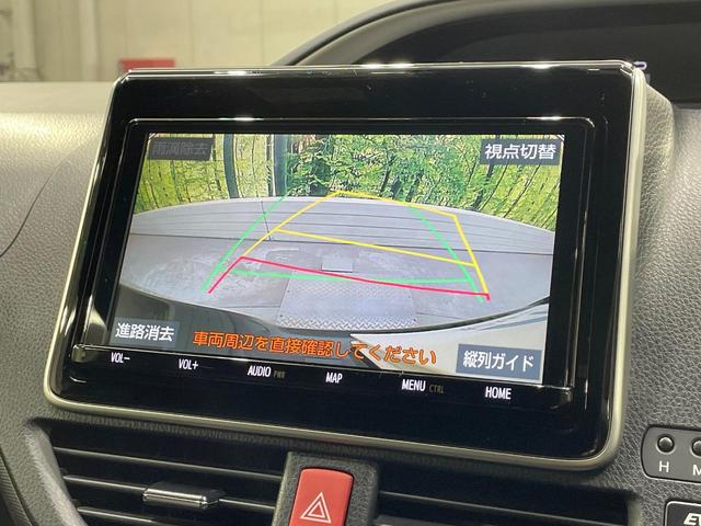 ヴォクシー ハイブリッドＺＳ　煌　純正９型ＳＤナビ　後席モニター　両側電動ドア　バックカメラ　衝突被害軽減システム　禁煙車　ドラレコ　スマートキー　ＬＥＤヘッド　ビルトインＥＴＣ　クルコン　純正１６ＡＷ　オートライト　デュアルエアコン（6枚目）