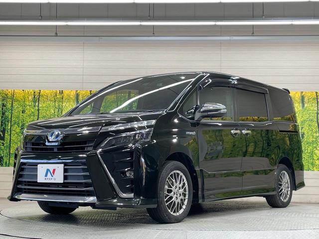 ヴォクシー ハイブリッドＺＳ　煌　純正９型ＳＤナビ　後席モニター　両側電動ドア　バックカメラ　衝突被害軽減システム　禁煙車　ドラレコ　スマートキー　ＬＥＤヘッド　ビルトインＥＴＣ　クルコン　純正１６ＡＷ　オートライト　デュアルエアコン（65枚目）