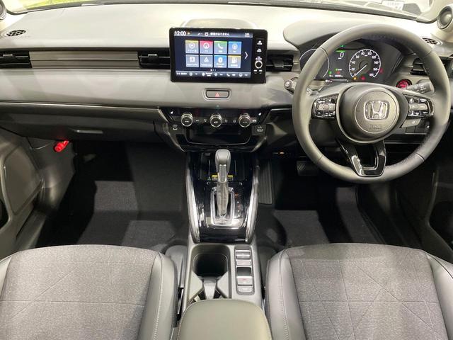 ヴェゼル ｅ：ＨＥＶ　Ｚ　登録済未使用車　純正９型ナビ　全周囲カメラ　衝突軽減装置　　電動リアゲート　ブラインドスポットモニター　コーナーセンサー　スマートキー　ＬＥＤヘッド　ＥＴＣ　純正１８インチアルミ　オートライト（2枚目）