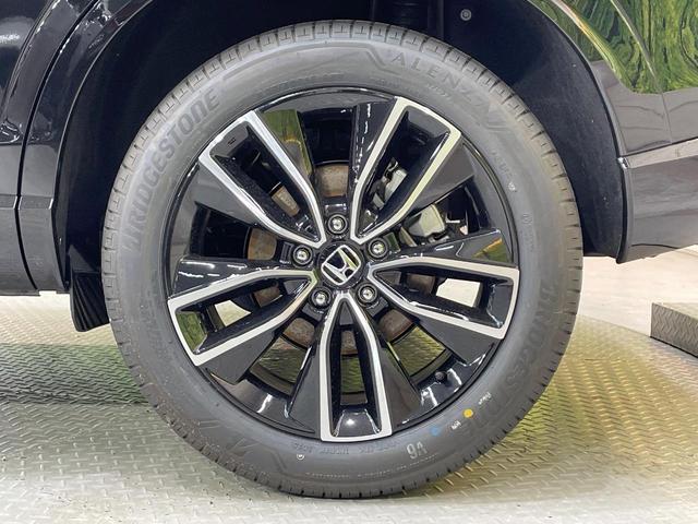ヴェゼル ｅ：ＨＥＶ　Ｚ　登録済未使用車　純正９型ナビ　全周囲カメラ　衝突軽減装置　　電動リアゲート　ブラインドスポットモニター　コーナーセンサー　スマートキー　ＬＥＤヘッド　ＥＴＣ　純正１８インチアルミ　オートライト（66枚目）