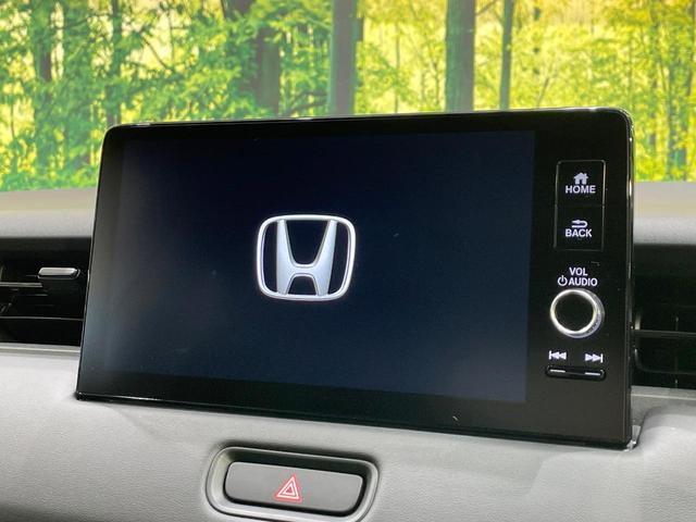 ヴェゼル ｅ：ＨＥＶ　Ｚ　登録済未使用車　純正９型ナビ　全周囲カメラ　衝突軽減装置　ＬＥＤヘッドライト　レーダークルーズ　電動リアゲート　ＥＴＣ　Ｂｌｕｅｔｏｏｔｈ　ブラインドスポットモニター　置くだけ充電　オートエアコン（3枚目）