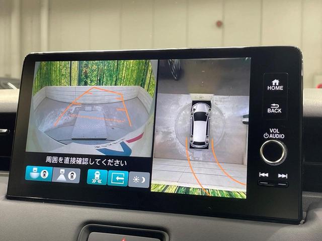 ヴェゼル ｅ：ＨＥＶ　Ｚ　登録済未使用車　純正９型ナビ　全周囲カメラ　衝突軽減装置　ＬＥＤヘッドライト　レーダークルーズ　電動リアゲート　ＥＴＣ　Ｂｌｕｅｔｏｏｔｈ　ブラインドスポットモニター　置くだけ充電　オートエアコン（4枚目）