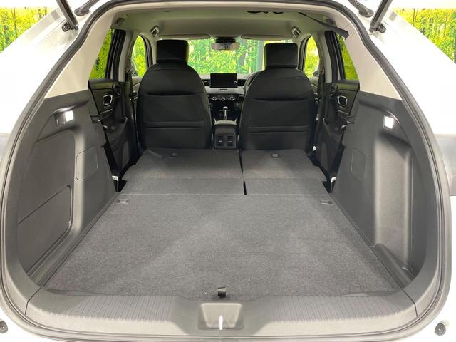 ヴェゼル ｅ：ＨＥＶ　Ｚ　登録済未使用車　純正９型ナビ　全周囲カメラ　衝突軽減装置　ＬＥＤヘッドライト　レーダークルーズ　電動リアゲート　ＥＴＣ　Ｂｌｕｅｔｏｏｔｈ　ブラインドスポットモニター　置くだけ充電　オートエアコン（10枚目）