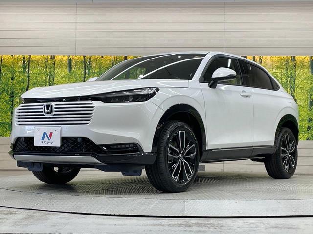 ヴェゼル ｅ：ＨＥＶ　Ｚ　登録済未使用車　純正９型ナビ　全周囲カメラ　衝突軽減装置　ＬＥＤヘッドライト　レーダークルーズ　電動リアゲート　ＥＴＣ　Ｂｌｕｅｔｏｏｔｈ　ブラインドスポットモニター　置くだけ充電　オートエアコン（16枚目）
