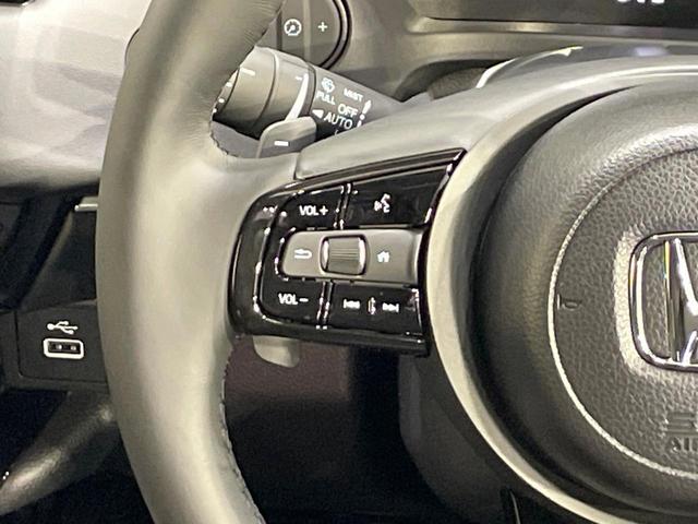 ヴェゼル ｅ：ＨＥＶ　Ｚ　登録済未使用車　純正９型ナビ　全周囲カメラ　衝突軽減装置　ＬＥＤヘッドライト　レーダークルーズ　電動リアゲート　ＥＴＣ　Ｂｌｕｅｔｏｏｔｈ　ブラインドスポットモニター　置くだけ充電　オートエアコン（46枚目）