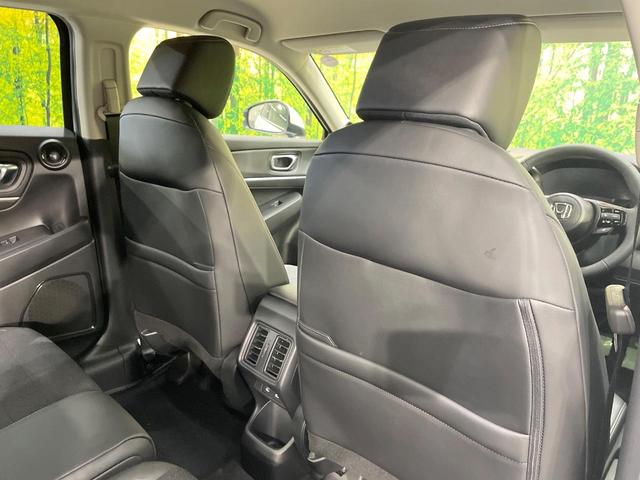 ヴェゼル ｅ：ＨＥＶ　Ｚ　登録済未使用車　純正９型ナビ　全周囲カメラ　衝突軽減装置　ＬＥＤヘッドライト　レーダークルーズ　電動リアゲート　ＥＴＣ　Ｂｌｕｅｔｏｏｔｈ　ブラインドスポットモニター　置くだけ充電　オートエアコン（55枚目）