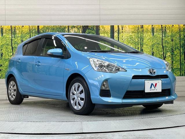 アクア Ｇ　禁煙車　ＣＤオーディオ　スマートキー　オートライト　オートエアコン　革巻きステアリング　電動格納ミラー　シートリフター　ドアザイザー　バニティミラー　パワーステアリング　パワーウィンドウ（16枚目）