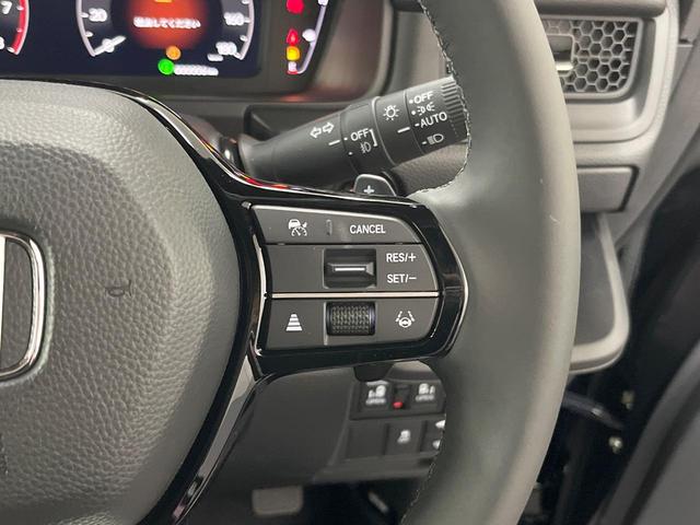 ステップワゴン スパーダ　登録済未使用車　純正１１インチＳＤナビ　両側電動スライドドア　バックカメラ　衝突被害軽減装置　レーダークルーズコントロール　フルセグＴＶ　Ｂｌｕｅｔｏｏｔｈ　ＬＥＤヘッド　オートエアコン　オートライト（6枚目）