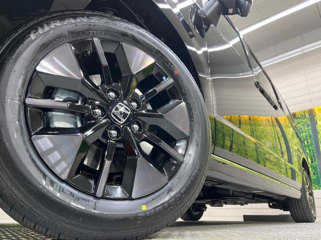 ステップワゴン スパーダ　登録済未使用車　純正１１インチＳＤナビ　両側電動スライドドア　バックカメラ　衝突被害軽減装置　レーダークルーズコントロール　フルセグＴＶ　Ｂｌｕｅｔｏｏｔｈ　ＬＥＤヘッド　オートエアコン　オートライト（12枚目）