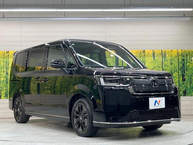 ステップワゴン スパーダ　登録済未使用車　純正１１インチＳＤナビ　両側電動スライドドア　バックカメラ　衝突被害軽減装置　レーダークルーズコントロール　フルセグＴＶ　Ｂｌｕｅｔｏｏｔｈ　ＬＥＤヘッド　オートエアコン　オートライト（16枚目）