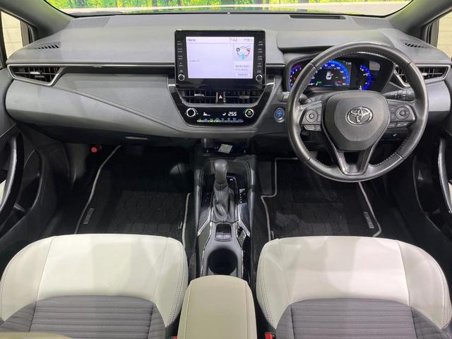 カローラツーリング ハイブリッド　ダブルバイビー　純正９型ＤＡ　衝突軽減装置　ＬＥＤヘッド　レーダークルーズ　ブラインドスポットモニター　ＥＴＣ　ドラレコ　Ｂｌｕｅｔｏｏｔｈ　ステアリングヒーター　シートヒーター　バックカメラ　オートエアコン（2枚目）