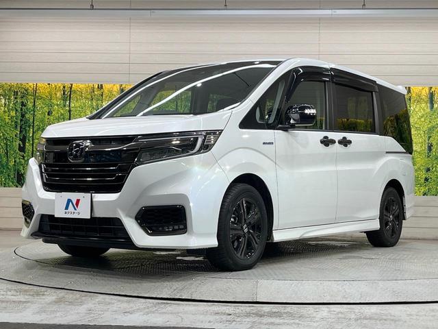 ステップワゴンスパーダ スパーダハイブリッド　Ｇ・ＥＸ　ホンダセンシング　両側電動スライド　純正ナビ　後席モニター　バックカメラ　衝突被害軽減装置　禁煙車　ハーフレザーシート　ドラレコ　コーナーセンサー　スマートキー　ＬＥＤヘッド　ＥＴＣ　Ｂｌｕｅｔｏｏｔｈ再生（62枚目）