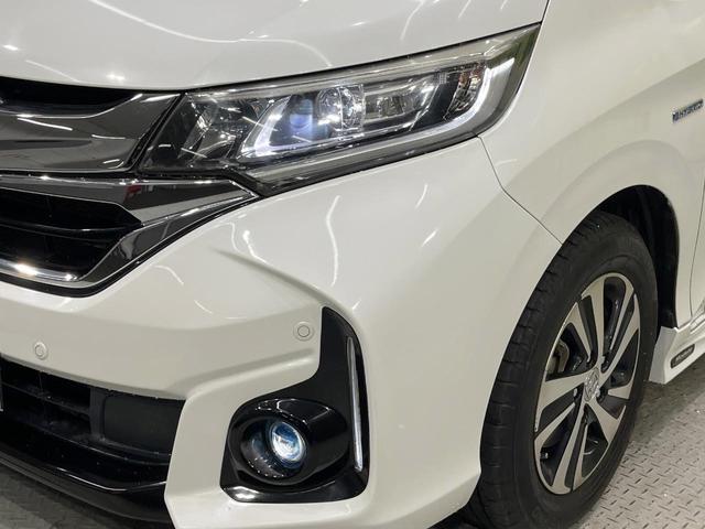 フリードハイブリッド ハイブリッド・ＥＸ　純正８型ナビ　バックカメラ　両側電動ドア　衝突被害軽減システム　レーダークルーズ　禁煙車　ハーフレザーシート　ドラレコ　コーナーセンサー　スマートキー　ＬＥＤヘッド　ビルトインＥＴＣ（13枚目）