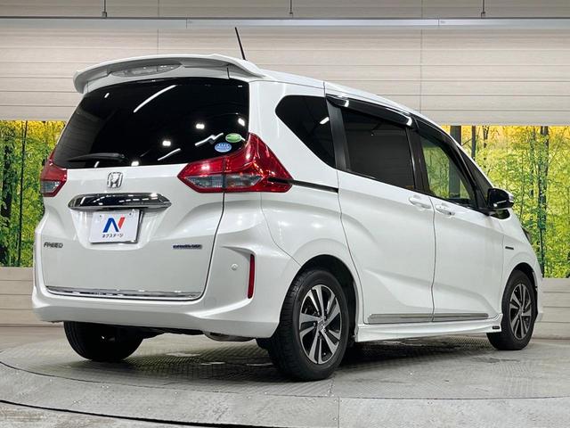 フリードハイブリッド ハイブリッド・ＥＸ　純正８型ナビ　バックカメラ　両側電動ドア　衝突被害軽減システム　レーダークルーズ　禁煙車　ハーフレザーシート　ドラレコ　コーナーセンサー　スマートキー　ＬＥＤヘッド　ビルトインＥＴＣ（65枚目）