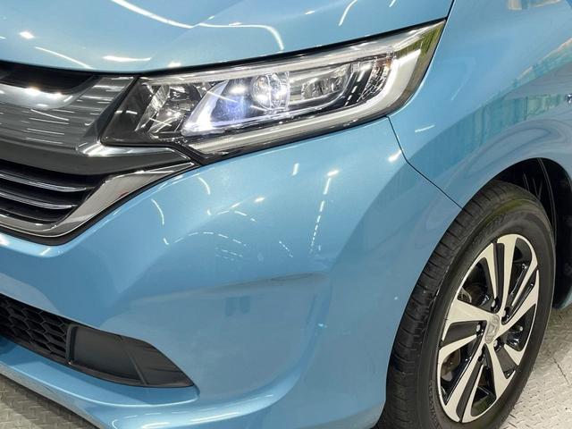 フリードハイブリッド ハイブリッド・ＥＸ　純正ナビ　バックカメラ　両側電動ドア　衝突被害軽減システム　レーダークルーズ　禁煙車　ハーフレザーシート　ドラレコ　スマートキー　ＬＥＤヘッド　ビルトインＥＴＣ　純正１６インチアルミ（13枚目）