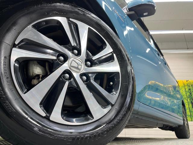 フリードハイブリッド ハイブリッド・ＥＸ　純正ナビ　バックカメラ　両側電動ドア　衝突被害軽減システム　レーダークルーズ　禁煙車　ハーフレザーシート　ドラレコ　スマートキー　ＬＥＤヘッド　ビルトインＥＴＣ　純正１６インチアルミ（14枚目）