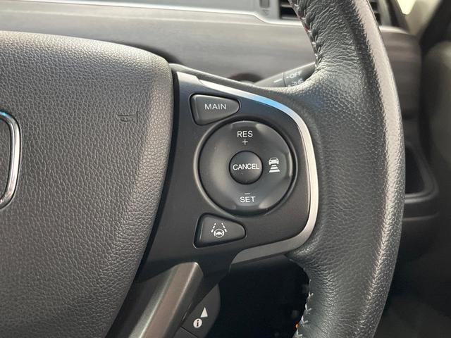 フリードハイブリッド ハイブリッド・ＥＸ　純正ナビ　バックカメラ　両側電動ドア　衝突被害軽減システム　レーダークルーズ　禁煙車　ハーフレザーシート　ドラレコ　スマートキー　ＬＥＤヘッド　ビルトインＥＴＣ　純正１６インチアルミ（34枚目）