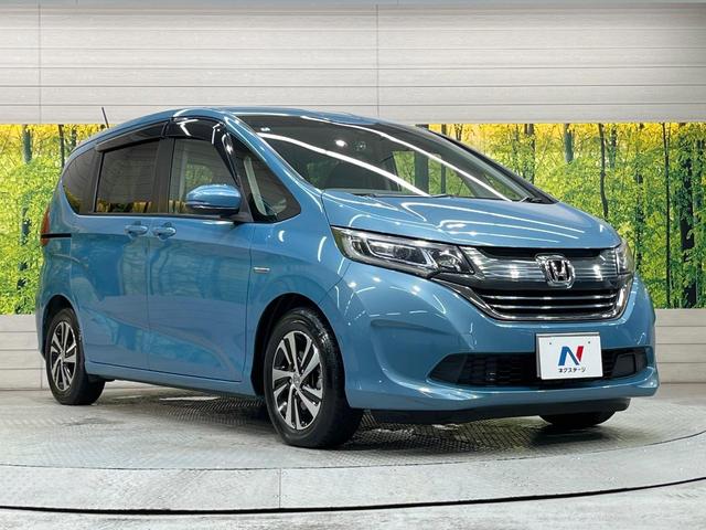 フリードハイブリッド ハイブリッド・ＥＸ　純正ナビ　バックカメラ　両側電動ドア　衝突被害軽減システム　レーダークルーズ　禁煙車　ハーフレザーシート　ドラレコ　スマートキー　ＬＥＤヘッド　ビルトインＥＴＣ　純正１６インチアルミ（60枚目）