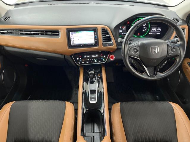 ヴェゼル ハイブリッドZ・ホンダセンシング 純正ナビ バックカメラ 衝突被害軽減装置 レーダークルーズ 禁煙車 レザーシート シートヒーター ドラレコ スマートキー LEDヘッド ETC 純正AW オートハイビーム オートエアコン オートライト(2枚目)