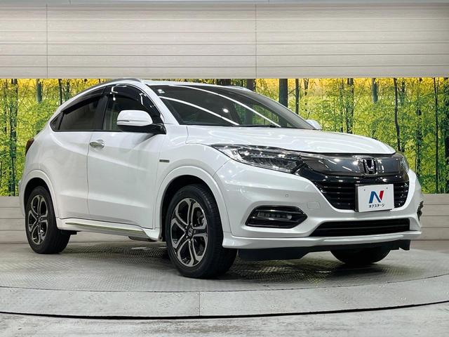 ヴェゼル ハイブリッドZ・ホンダセンシング 純正ナビ バックカメラ 衝突被害軽減装置 レーダークルーズ 禁煙車 レザーシート シートヒーター ドラレコ スマートキー LEDヘッド ETC 純正AW オートハイビーム オートエアコン オートライト(16枚目)