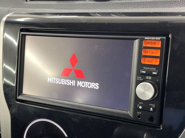 ｅＫカスタム Ｔ　純正ナビ　バックカメラ　禁煙車　スマートキー　ＨＩＤヘッド　純正１５インチアルミ　オートエアコン　ＣＤ　ＤＶＤ再生　フルセグ　電動格納ミラー　盗難防止システム（3枚目）