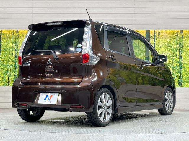 ｅＫカスタム Ｔ　純正ナビ　バックカメラ　禁煙車　スマートキー　ＨＩＤヘッド　純正１５インチアルミ　オートエアコン　ＣＤ　ＤＶＤ再生　フルセグ　電動格納ミラー　盗難防止システム（17枚目）