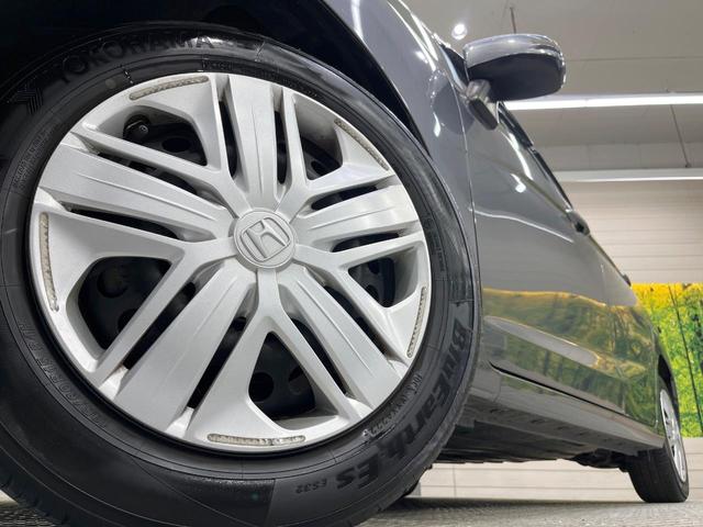 フィット １３Ｇ・Ｌ　ホンダセンシング　純正ナビ　衝突軽減装置　レーダークルーズ　ＥＴＣ　バックカメラ　ＬＥＤヘッド　ドラレコ　オートエアコン　スマートキー　プッシュスタート　シートリフター　電動格納ドアミラー　アイドリングストップ（13枚目）