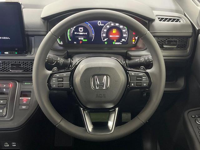 ステップワゴン ｅ：ＨＥＶスパーダ　登録済未使用車　純正１１．４型ナビ　両側電動スライド　レーダークルーズ　ブラインドスポットモニター　衝突軽減装置　ＬＥＤヘッド　Ｂｌｕｅｔｏｏｔｈ　フルセグＴＶ　シートヒーター　電動リアゲート（12枚目）