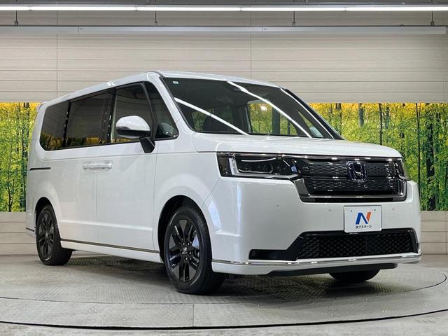 ステップワゴン ｅ：ＨＥＶスパーダ　登録済未使用車　純正１１．４型ナビ　両側電動スライド　レーダークルーズ　ブラインドスポットモニター　衝突軽減装置　ＬＥＤヘッド　Ｂｌｕｅｔｏｏｔｈ　フルセグＴＶ　シートヒーター　電動リアゲート（66枚目）