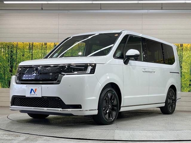 ステップワゴン ｅ：ＨＥＶスパーダ　登録済未使用車　純正１１．４型ナビ　両側電動スライド　レーダークルーズ　ブラインドスポットモニター　衝突軽減装置　ＬＥＤヘッド　Ｂｌｕｅｔｏｏｔｈ　フルセグＴＶ　シートヒーター　電動リアゲート（67枚目）