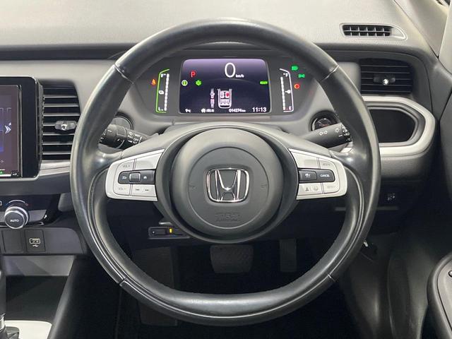 フィット ｅ：ＨＥＶホーム　純正８型ナビ　ＥＴＣ　ドラレコ　レーダークルーズ　ＬＥＤヘッド　衝突軽減装置　バックカメラ　オートエアコン　電動パーキング　オートホールド　スマートキー　プッシュスタート　フルセグＴＶ（11枚目）