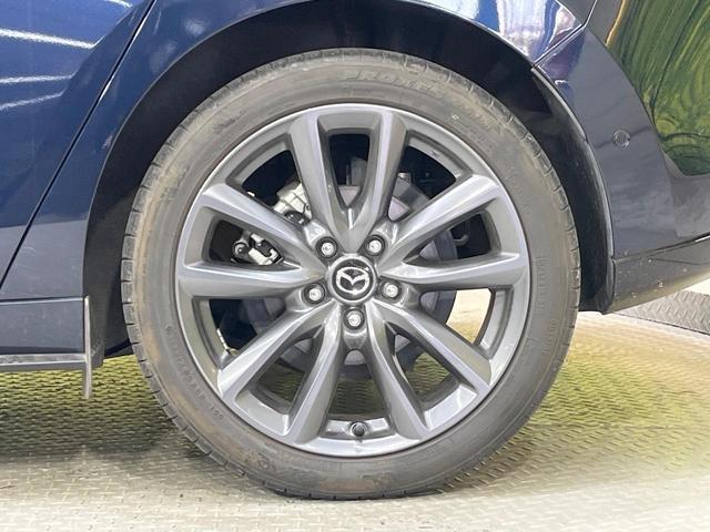 MAZDA3ファストバック 15Sツーリング MT車 純正SDナビ 全周囲カメラ 衝突被害軽減システム レーダークルーズ 禁煙車 コーナーセンサー スマートキー LEDヘッド ビルトインETC オートハイビーム 車線逸脱警報 オートライト(64枚目)