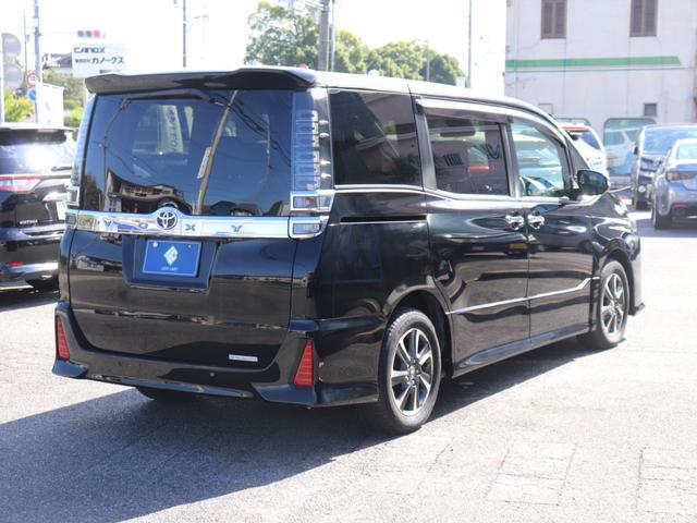 ヴォクシー ZS 煌II ワンオーナー後期モデル セーフティセンス両側電動ドアLEDヘッド社外ナビBカメラ地デジBT音楽 革巻きHクルーズコントロール ステアリングリモコン リアオートエアコンDバイザPガラス純正16AW(7枚目)