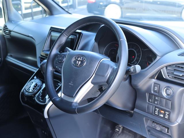 ヴォクシー ZS 煌II ワンオーナー後期モデル セーフティセンス両側電動ドアLEDヘッド社外ナビBカメラ地デジBT音楽 革巻きHクルーズコントロール ステアリングリモコン リアオートエアコンDバイザPガラス純正16AW(29枚目)