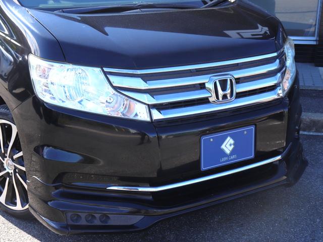 ステップワゴン G インターナビEセレクション 無限エアロ両側電動ドア後席モニター純正インターナビBカメラ地デジ クルーズコントロールRCA入力レザー調シートカバー ステアリングリモコン オートライトHIDヘッド社外18AW Rスモークフィルム(19枚目)