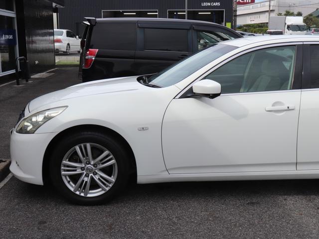 スカイライン 250GT ハーフレザーシート純正HDDナビBカメラ地デジHIDヘッドFフォグ純正17インチAWビルトインETCインテリキー革巻きHステアリングリモコン前席パワーシート プライバシーガラス(11枚目)