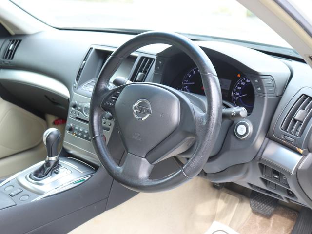 スカイライン 250GT ハーフレザーシート純正HDDナビBカメラ地デジHIDヘッドFフォグ純正17インチAWビルトインETCインテリキー革巻きHステアリングリモコン前席パワーシート プライバシーガラス(27枚目)