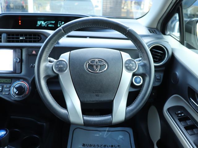 アクア Ｇ　純正ＳＤナビＢカメラ地デジＢＴ音楽スマートキー前席シートヒーター革巻きＨステアリングリモコン　オートエアコン　ライトレベライザＥＴＣドアバイザ　プライバシーガラス純正１５ＳＷ（34枚目）