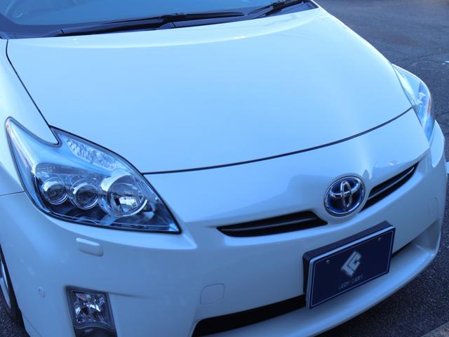 プリウス Ｓツーリングセレクション　ＬＥＤヘッド純正ＨＤＤナビＢカメラ地デジＢＴ音楽ＦフォグＤバイザ純正１７インチＡＷプライバシーガラス革巻きＨビルトインＥＴＣプッシュスタート　スマートキー　ヘッドライトウォッシャー　オートエアコン（21枚目）