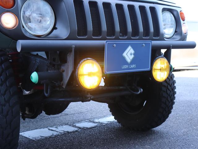 ジムニー ランドベンチャー リフトアップ社外ステアリング社外ウッドパネル社外リアスポイラー社外ホーンボタンETCシートカバー社外オーディオ純正16インチAWデジタルランドメーター背面タイヤFフォグ(17枚目)