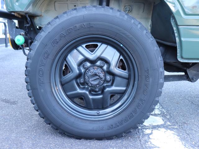 ジムニー ランドベンチャー リフトアップ社外ステアリング社外ウッドパネル社外リアスポイラー社外ホーンボタンETCシートカバー社外オーディオ純正16インチAWデジタルランドメーター背面タイヤFフォグ(23枚目)
