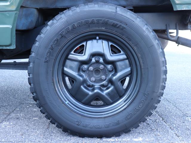 ジムニー ランドベンチャー リフトアップ社外ステアリング社外ウッドパネル社外リアスポイラー社外ホーンボタンETCシートカバー社外オーディオ純正16インチAWデジタルランドメーター背面タイヤFフォグ(24枚目)