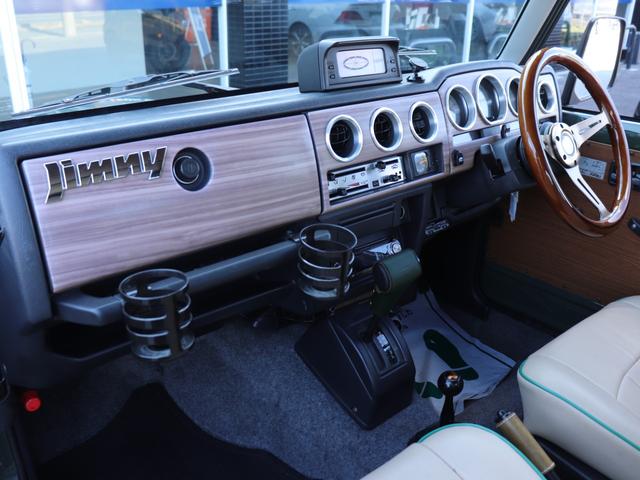 ジムニー ランドベンチャー リフトアップ社外ステアリング社外ウッドパネル社外リアスポイラー社外ホーンボタンETCシートカバー社外オーディオ純正16インチAWデジタルランドメーター背面タイヤFフォグ(30枚目)