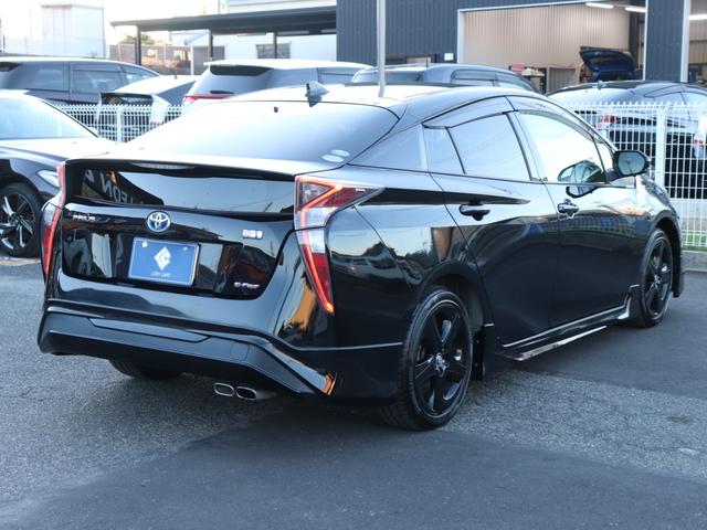 プリウス Ｓツーリングセレクション　モデリスタフルエアロ　セーフティセンスＬＥＤヘッド社外メモリーナビＢカメラ地デジＢＴ音楽ＡＣ１００Ｖスマートキー合皮シート前席シートヒーター純正１７ＡＷプッシュスタートＲフォグ革巻きＨステコンＥＴＣ（7枚目）