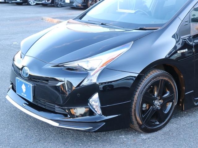 プリウス Ｓツーリングセレクション　モデリスタフルエアロ　セーフティセンスＬＥＤヘッド社外メモリーナビＢカメラ地デジＢＴ音楽ＡＣ１００Ｖスマートキー合皮シート前席シートヒーター純正１７ＡＷプッシュスタートＲフォグ革巻きＨステコンＥＴＣ（16枚目）